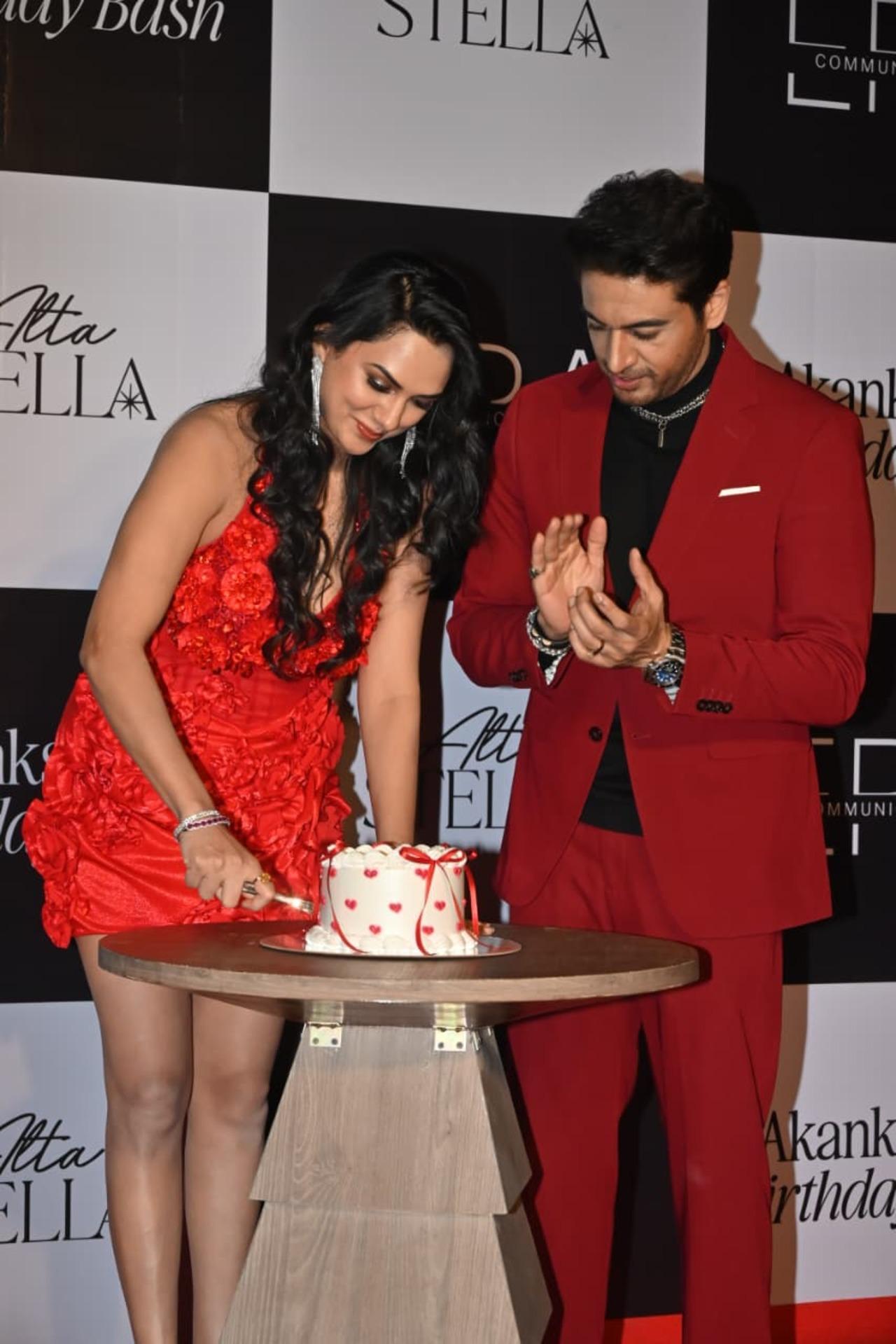 

Gaurav Khanna celebrated his wife, actress Akanksha Chamola's birthday on Thursday night. The couple twinned in red as they posed for paps.

